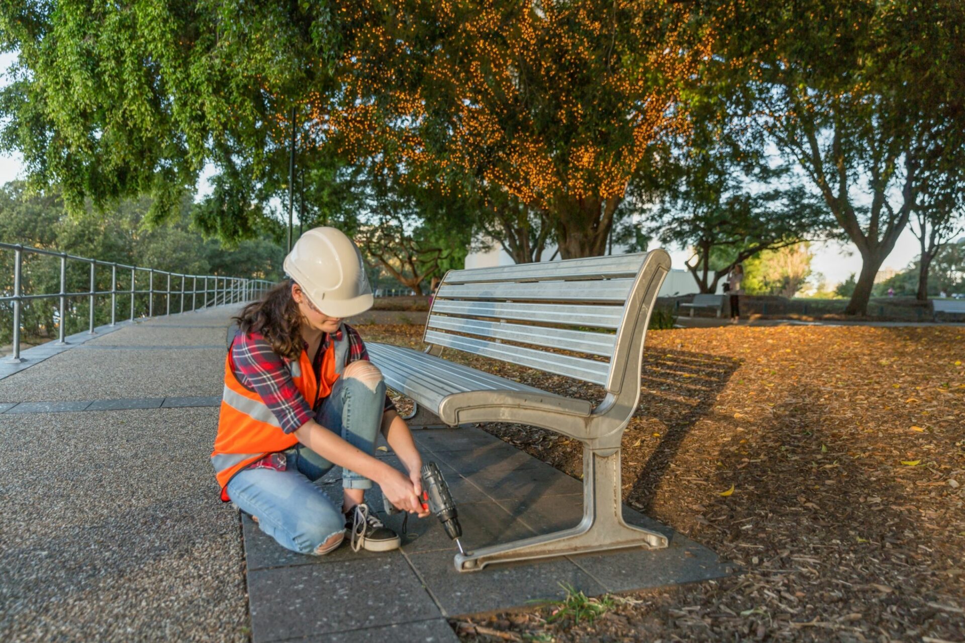 Incorporating features like seating into public spaces can be one way of thinking about “care” in design. Another is considering how the space will be maintained — and the people who will do the maintenance. Photographer: Marianne Purdie/Moment RF
