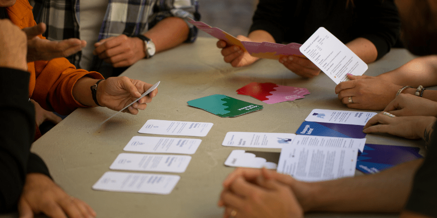 Helsinki residents play a card game intended to help spark ideas for projects that the city can fund.